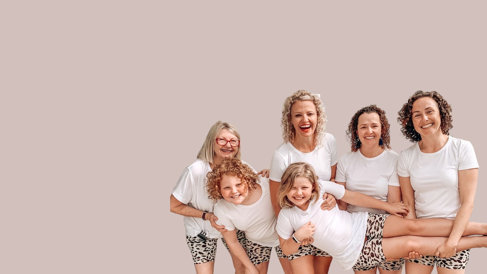 Susie Taaffe, founder of Skanties, laughing with her three children.